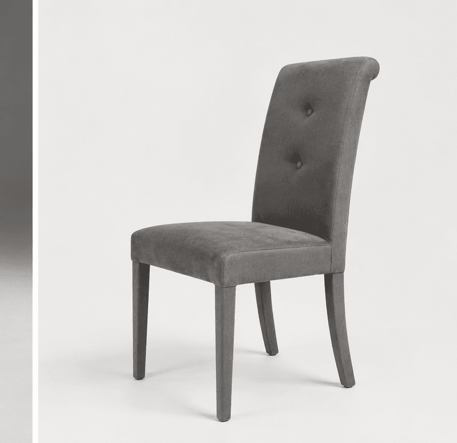 Curly Denver dining chair fully upholstered in grey velvet fabric, with a rolled top, two buttons and tapered legs, studio shot